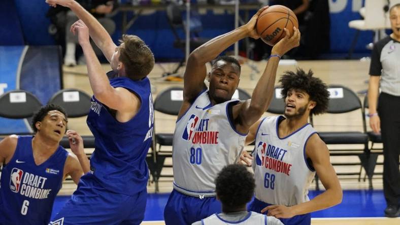 May 17, 2023; Chicago, Il, USA; Oscar Tshiebwe (80) grabs a rebound during the 2023 NBA Draft Combine at Wintrust Arena. Mandatory Credit: David Banks-USA TODAY Sports