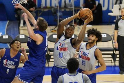 May 17, 2023; Chicago, Il, USA; Oscar Tshiebwe (80) grabs a rebound during the 2023 NBA Draft Combine at Wintrust Arena. Mandatory Credit: David Banks-USA TODAY Sports