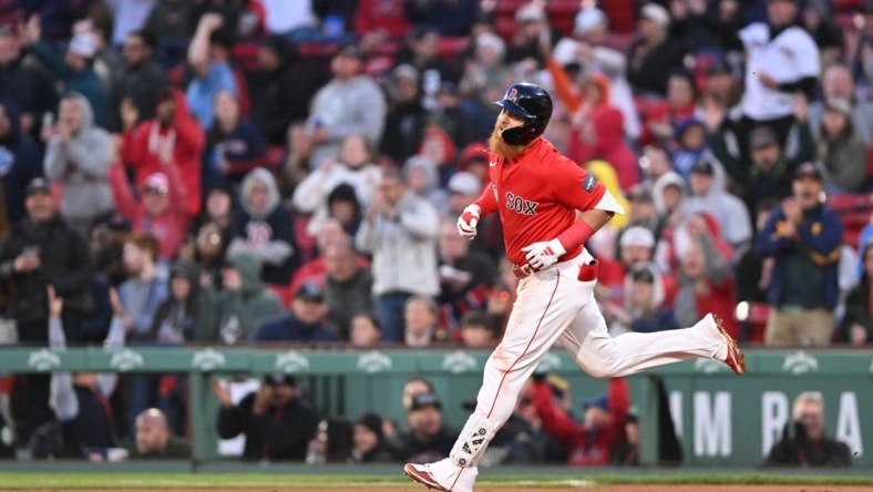 May 17, 2023; Boston, Massachusetts, USA;  Boston Red Sox designated hitter Justin Turner (2) runs the bases after hitting a two run home run against the Seattle Mariners during the second inning at Fenway Park. Mandatory Credit: Brian Fluharty-USA TODAY Sports