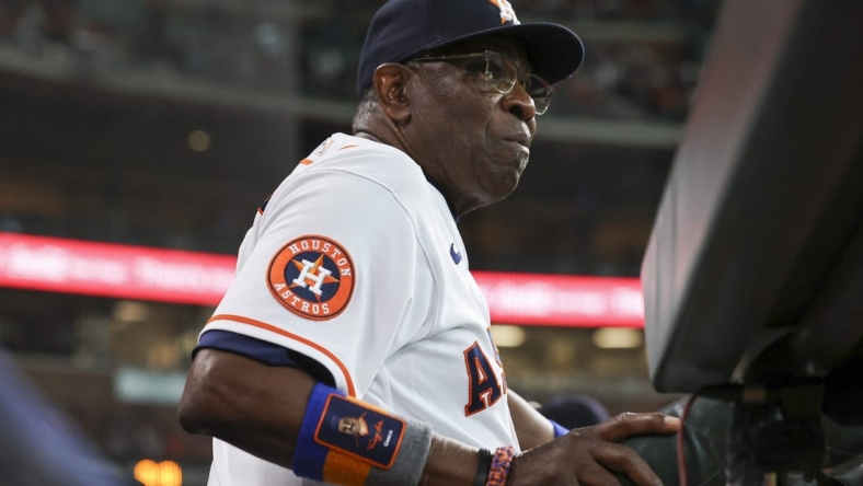 May 17, 2023; Houston, Texas, USA; Houston Astros manager Dusty Baker Jr. (12) looks on from the dugout during the first inning against the Chicago Cubs at Minute Maid Park. Mandatory Credit: Troy Taormina-USA TODAY Sports