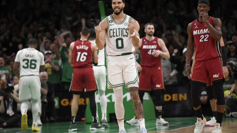 May 17, 2023; Boston, Massachusetts, USA; Boston Celtics forward Jayson Tatum (0) reacts after a play during the first half against the Miami Heat in game one of the Eastern Conference Finals for the 2023 NBA playoffs at TD Garden. Mandatory Credit: Bob DeChiara-USA TODAY Sports