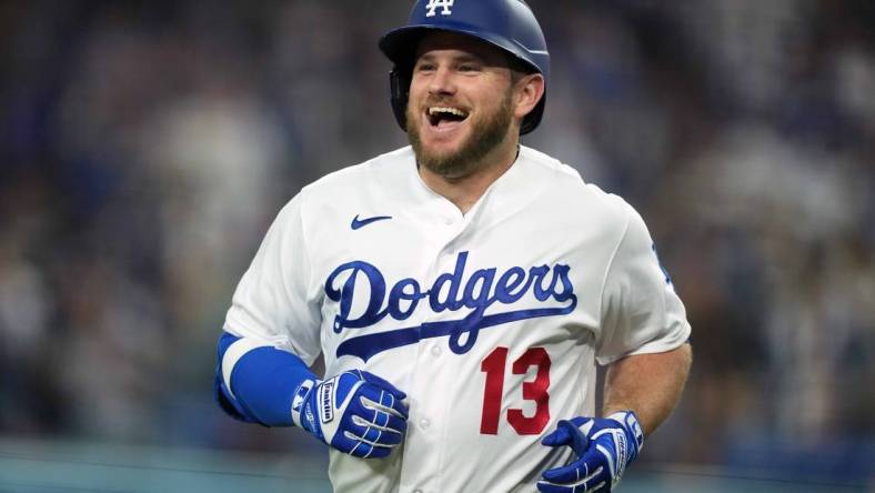 May 15, 2023; Los Angeles, California, USA; Los Angeles Dodgers third baseman Max Muncy (13) celebrates after hitting a home run in the fourth inning against the Minnesota Twins at Dodger Stadium. Mandatory Credit: Kirby Lee-USA TODAY Sports