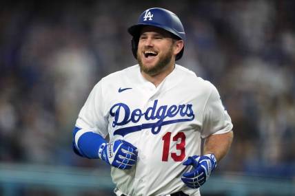 May 15, 2023; Los Angeles, California, USA; Los Angeles Dodgers third baseman Max Muncy (13) celebrates after hitting a home run in the fourth inning against the Minnesota Twins at Dodger Stadium. Mandatory Credit: Kirby Lee-USA TODAY Sports