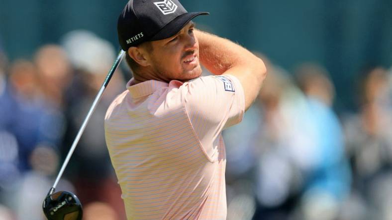 May 18, 2023; Rochester, New York, USA; Bryson DeChambeau tees off on the 14th hole during the first round of the PGA Championship golf tournament at Oak Hill Country Club. Mandatory Credit: Aaron Doster-USA TODAY Sports