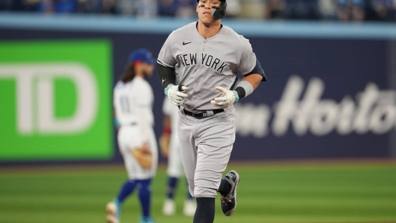 May 18, 2023; Toronto, Ontario, CAN; New York Yankees designated hitter Aaron Judge (99) runs the bases after hitting a two run home run against the Toronto Blue Jays during the first inning at Rogers Centre. Mandatory Credit: Nick Turchiaro-USA TODAY Sports