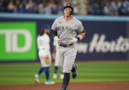 May 18, 2023; Toronto, Ontario, CAN; New York Yankees designated hitter Aaron Judge (99) runs the bases after hitting a two run home run against the Toronto Blue Jays during the first inning at Rogers Centre. Mandatory Credit: Nick Turchiaro-USA TODAY Sports