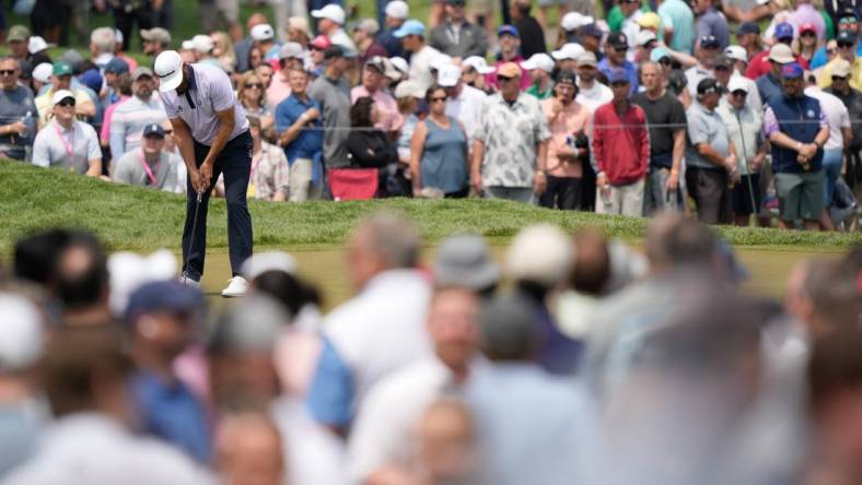 May 19, 2023; Rochester, New York, USA; Dustin Johnson putts on the sixth green during the second round of the PGA Championship golf tournament. Mandatory Credit: Adam Cairns-USA TODAY Sports