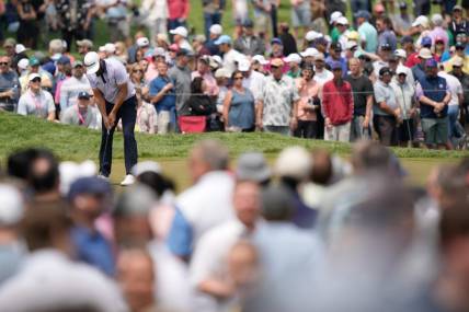 May 19, 2023; Rochester, New York, USA; Dustin Johnson putts on the sixth green during the second round of the PGA Championship golf tournament. Mandatory Credit: Adam Cairns-USA TODAY Sports