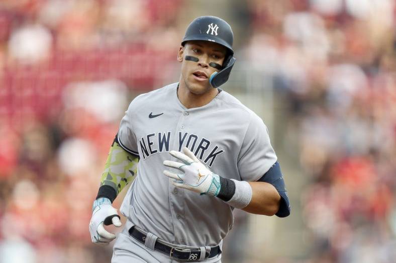 May 19, 2023; Cincinnati, Ohio, USA; New York Yankees right fielder Aaron Judge (99) runs the bases after hitting a solo home run in the first inning against the Cincinnati Reds at Great American Ball Park. Mandatory Credit: Katie Stratman-USA TODAY Sports