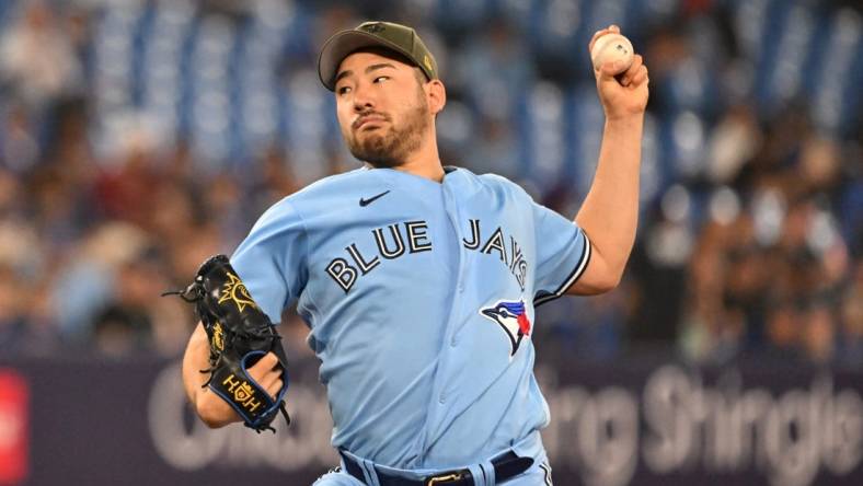 May 19, 2023; Toronto, Ontario, CAN;   Toronto Blue Jays starting pitcher Yusei Kikuchi (16) delivers a pitch against the Baltimore Orioles in the second inning at Rogers Centre. Mandatory Credit: Dan Hamilton-USA TODAY Sports