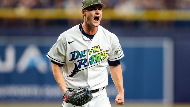 May 19, 2023; St. Petersburg, Florida, USA;  Tampa Bay Rays starting pitcher Shane McClanahan (18) reacts after a strikeout against the Milwaukee Brewers in the seventh inning at Tropicana Field. Mandatory Credit: Nathan Ray Seebeck-USA TODAY Sports