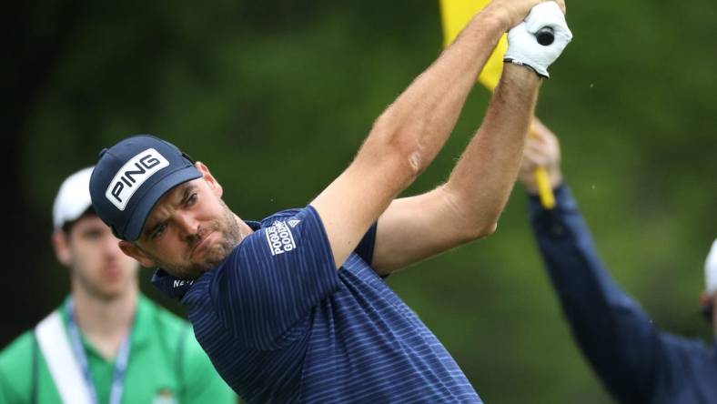 Corey Conners hits his tee shot the 7th-hole.