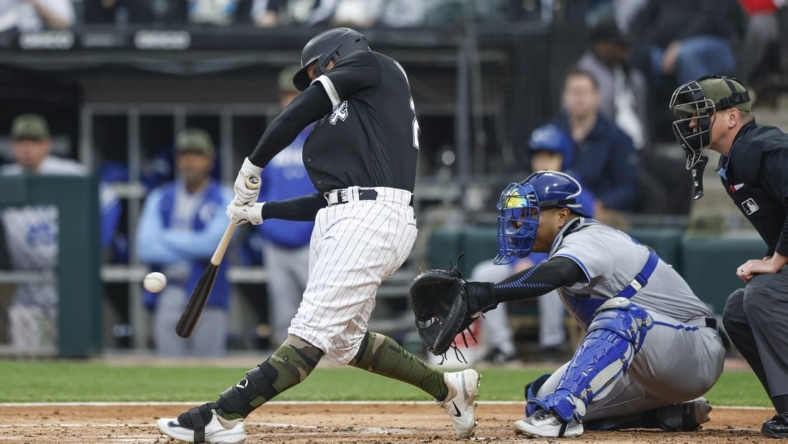May 19, 2023; Chicago, Illinois, USA; Chicago White Sox first baseman Andrew Vaughn (25) singles against the Kansas City Royals during the second inning at Guaranteed Rate Field. Mandatory Credit: Kamil Krzaczynski-USA TODAY Sports