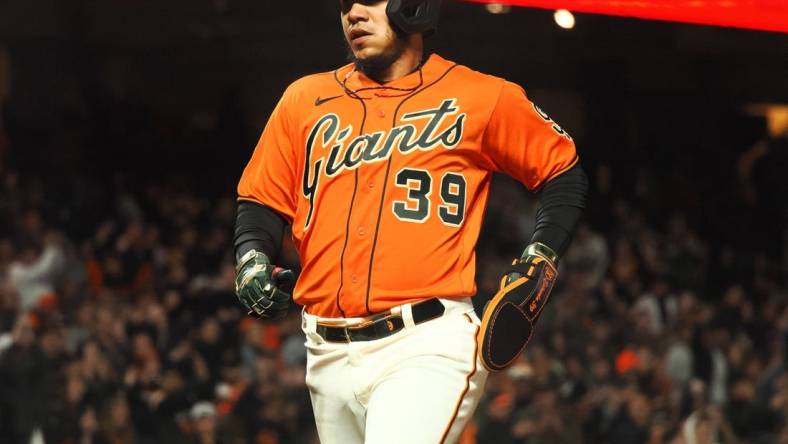 May 19, 2023; San Francisco, California, USA; San Francisco Giants second baseman Thairo Estrada (39) scores a run against the Miami Marlins during the sixth inning at Oracle Park. Mandatory Credit: Kelley L Cox-USA TODAY Sports