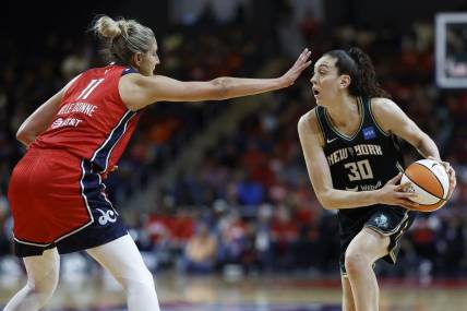 May 19, 2023; Washington, District of Columbia, USA; New York Liberty forward Breanna Stewart (30) holds the ball as Washington Mystics forward Elena Delle Donne (11) defends at Entertainment & Sports Arena. Mandatory Credit: Geoff Burke-USA TODAY Sports