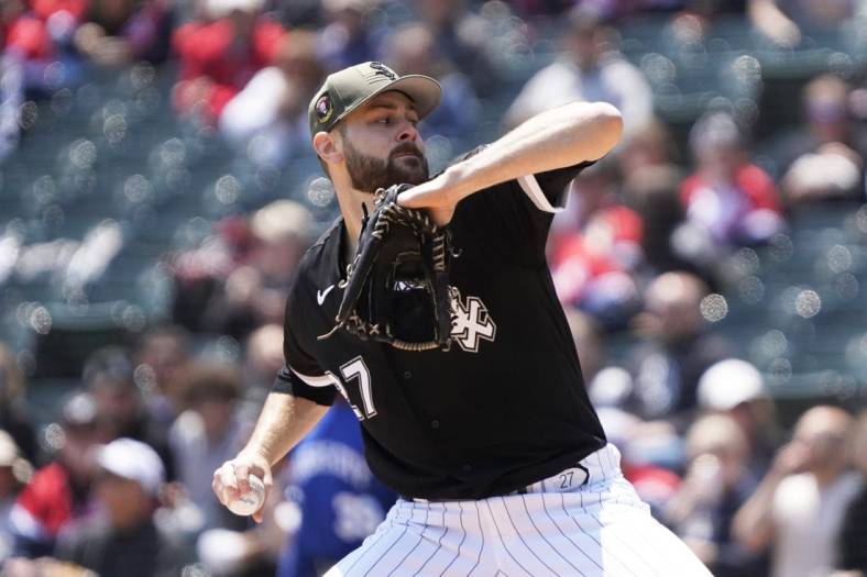May 20, 2023; Chicago, Illinois, USA; Chicago White Sox starting pitcher Lucas Giolito (27) throws the ball against the Kansas City Royals during the first inning at Guaranteed Rate Field. Mandatory Credit: David Banks-USA TODAY Sports