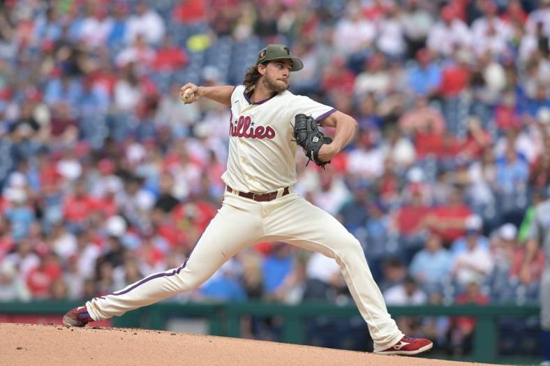 May 20, 2023; Philadelphia, Pennsylvania, USA; Philadelphia Phillies starting pitcher Aaron Nola (27) pitches in the first inning of the game against the Chicago Cubs at Citizens Bank Park. Mandatory Credit: John Geliebter-USA TODAY Sports