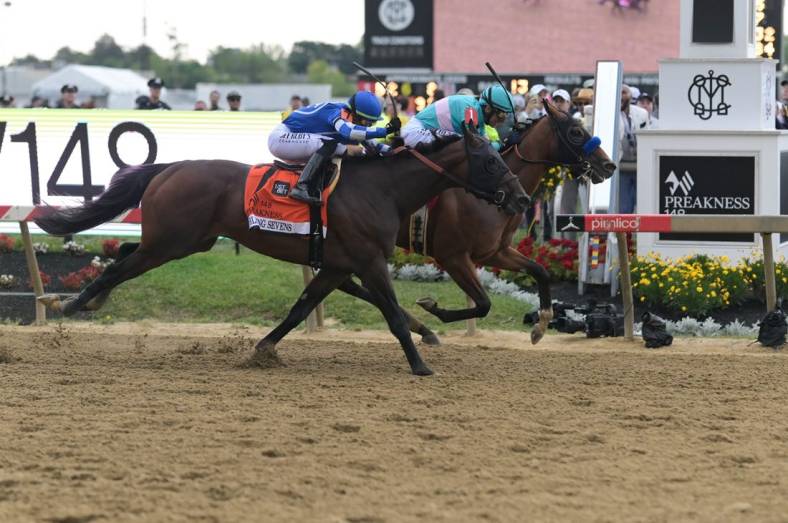 May 20, 2023; Baltimore, Maryland, USA;  National Treasure with John R. Velazquez up (1) defeats Blazing Sevens with Irad Ortiz, Jr. up (7) to win the 148th running of the Preakness Stakes at Pimlico Race Course. Mandatory Credit: Tommy Gilligan-USA TODAY Sports