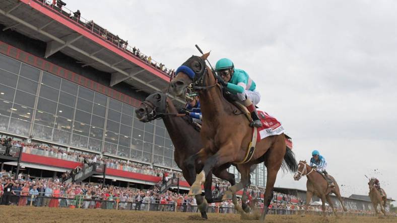 May 20, 2023; Baltimore, Maryland, USA;  National Treasure with John R. Velazquez up (1) defeats Blazing Sevens with Irad Ortiz, Jr. up (7) to win the 148th running of the Preakness Stakes at Pimlico Race Course. Mandatory Credit: Tommy Gilligan-USA TODAY Sports