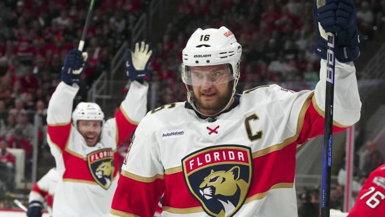 May 20, 2023; Raleigh, North Carolina, USA; Florida Panthers center Aleksander Barkov (16) celebrates his goal against Carolina Hurricanes goaltender Antti Raanta (32) in the second period of game two of the Eastern Conference Finals of the 2023 Stanley Cup Playoffs at PNC Arena. Mandatory Credit: James Guillory-USA TODAY Sports