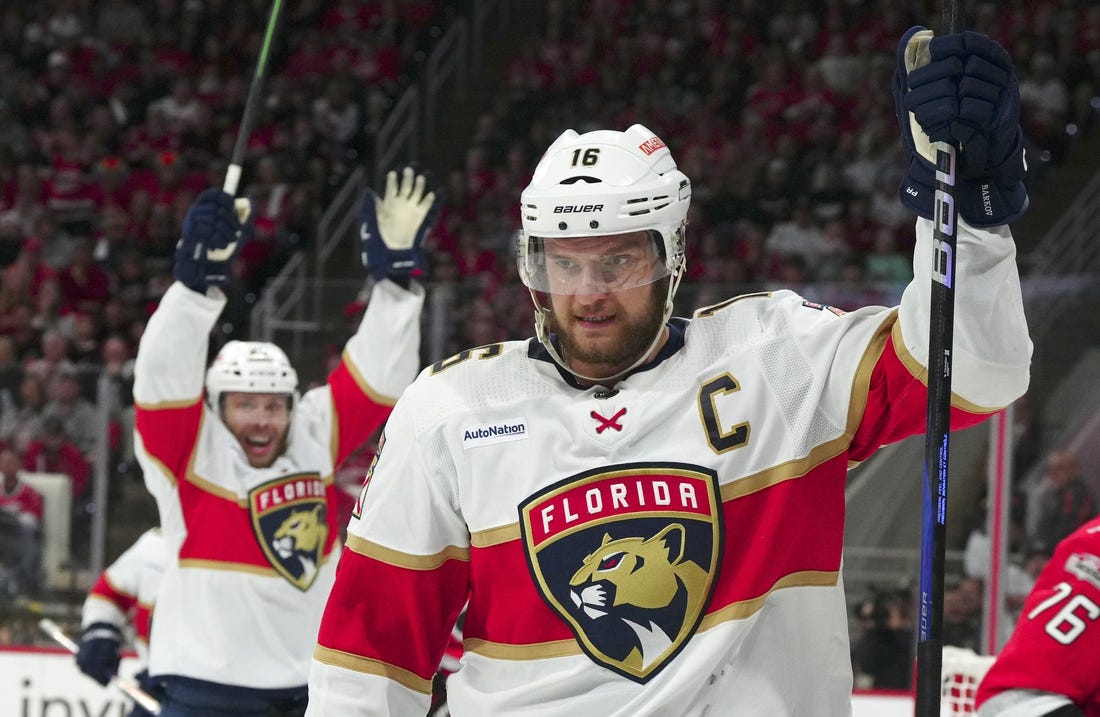 May 20, 2023; Raleigh, North Carolina, USA; Florida Panthers center Aleksander Barkov (16) celebrates his goal against Carolina Hurricanes goaltender Antti Raanta (32) in the second period of game two of the Eastern Conference Finals of the 2023 Stanley Cup Playoffs at PNC Arena. Mandatory Credit: James Guillory-USA TODAY Sports