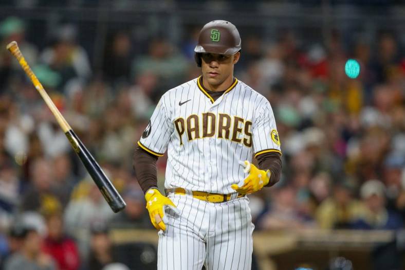 May 20, 2023; San Diego, California, USA; San Diego Padres left fielder Juan Soto (22) throws his bat after drawing a walk in the ninth inning against against the Boston Red Sox at Petco Park. Mandatory Credit: David Frerker-USA TODAY Sports