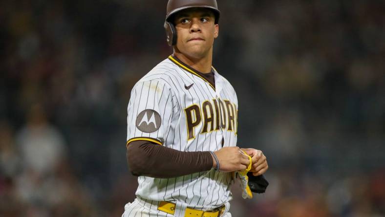 May 20, 2023; San Diego, California, USA; San Diego Padres left fielder Juan Soto (22) walks to first base after drawing a walk in the ninth inning against the Boston Red Sox at Petco Park. Mandatory Credit: David Frerker-USA TODAY Sports