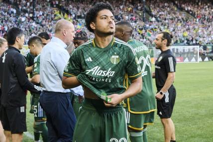 May 20, 2023; Portland, Oregon, USA; Portland Timbers midfielder Evander (20) prepares on the sidelines before a game against Minnesota United at Providence Park. Mandatory Credit: Troy Wayrynen-USA TODAY Sports
