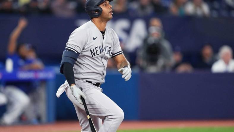 May 18, 2023; Toronto, Ontario, CAN; New York Yankees left fielder Aaron Hicks (31) reacts after hitting a double against the Toronto Blue Jays during the ninth inning at Rogers Centre. Mandatory Credit: Nick Turchiaro-USA TODAY Sports