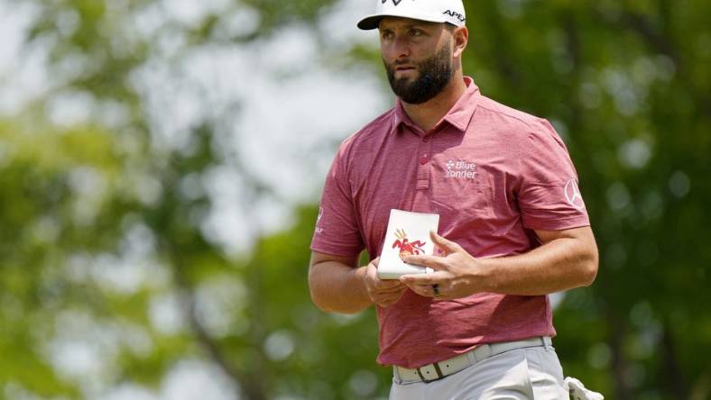 May 21, 2023; Rochester, New York, USA; Jon Rahm walks on the ninth hole during the final round of the PGA Championship golf tournament at Oak Hill Country Club. Mandatory Credit: Adam Cairns-USA TODAY Sports