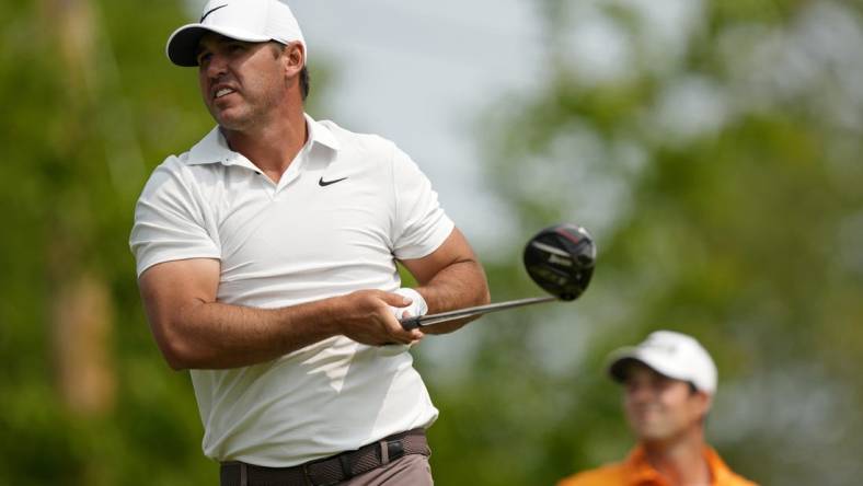 May 21, 2023; Rochester, New York, USA; Brooks Koepka tees off on the fourth hole during the final round of the PGA Championship golf tournament at Oak Hill Country Club. Mandatory Credit: Adam Cairns-USA TODAY Sports