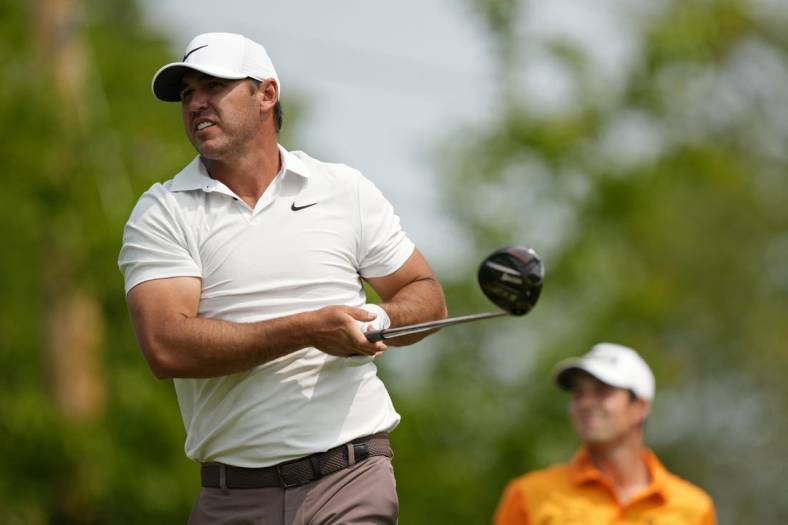 May 21, 2023; Rochester, New York, USA; Brooks Koepka tees off on the fourth hole during the final round of the PGA Championship golf tournament at Oak Hill Country Club. Mandatory Credit: Adam Cairns-USA TODAY Sports