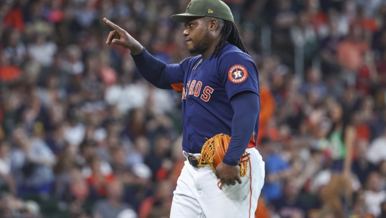 May 21, 2023; Houston, Texas, USA; Houston Astros starting pitcher Framber Valdez (59) walks off the mound after pitching during the seventh inning against the Oakland Athletics at Minute Maid Park. Mandatory Credit: Troy Taormina-USA TODAY Sports