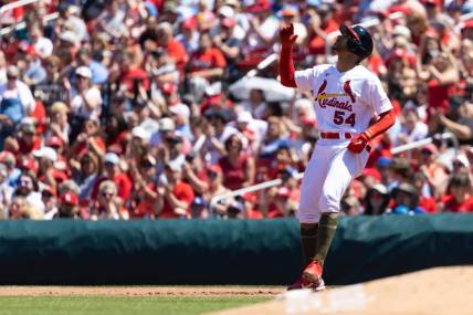 May 21, 2023; St. Louis, Missouri, USA;  St. Louis Cardinals  scar Mercado (54) hits a single against the Los Angeles Dodgers in the fourth inning at Busch Stadium. Mandatory Credit: Zach Dalin-USA TODAY Sports