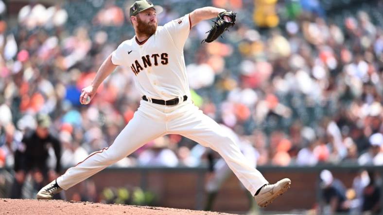 May 21, 2023; San Francisco, California, USA; San Francisco Giants pitcher John Brebbia (59) throws a pitch against the Miami Marlins during the fourth inning at Oracle Park. Mandatory Credit: Robert Edwards-USA TODAY Sports