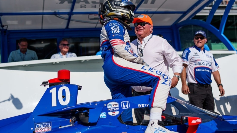 May 21, 2023; Indianapolis, Indiana, USA; Chip Ganassi Racing driver Alex Palou (10) talks with team owner Chip Ganassi after his final fun for the pole position Sunday, May 21, 2023, during Firestone Fast Six qualifying at Indianapolis Motor Speedway in preparation for the 107th running of the Indianapolis 500. Mandatory Credit: Mykal McEldowney-USA TODAY Sports