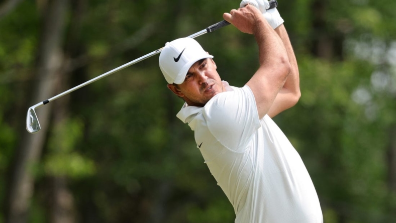 Brooks Koepka hits his tee shot on the third hole at the 2023 PGA Championship.