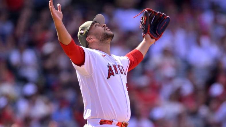 May 21, 2023; Anaheim, California, USA;  Los Angeles Angels relief pitcher Carlos Estevez (53) reacts after earning a save in the ninth against the Minnesota Twins at Angel Stadium. Mandatory Credit: Jayne Kamin-Oncea-USA TODAY Sports