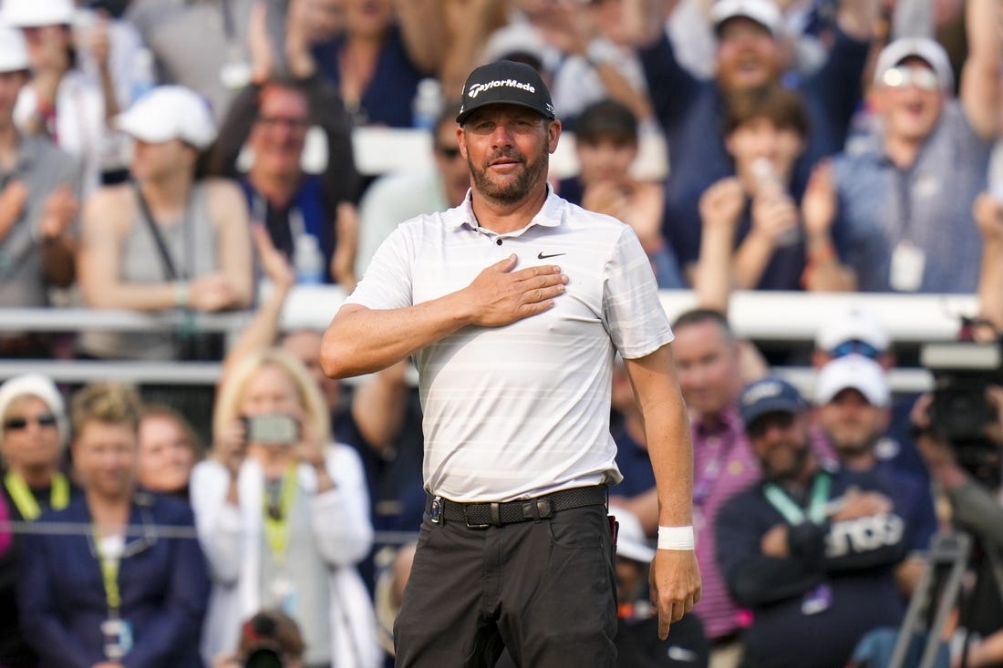 May 21, 2023; Rochester, New York, USA; Michael Block anckolwedges the fans on the 18th green during the final round of the PGA Championship golf tournament at Oak Hill Country Club. Mandatory Credit: Aaron Doster-USA TODAY Sports