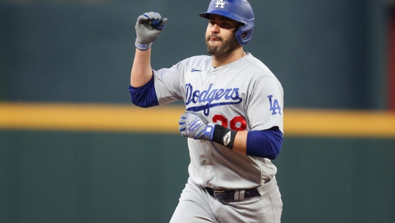 May 22, 2023; Atlanta, Georgia, USA; Los Angeles Dodgers designated hitter J.D. Martinez (28) reacts after a home run against the Atlanta Braves in the second inning at Truist Park. Mandatory Credit: Brett Davis-USA TODAY Sports