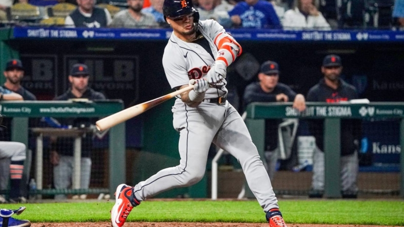 May 22, 2023; Kansas City, Missouri, USA; Detroit Tigers shortstop Javier Baez (28) hits a two-run double against the Kansas City Royals in the tenth inning at Kauffman Stadium. Mandatory Credit: Denny Medley-USA TODAY Sports