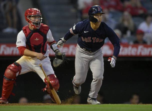 Baseball nuts Alex Cora, Masataka Yoshida bonding over their