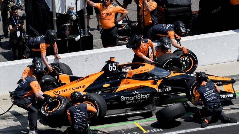 Arrow McLaren SP driver Tony Kanaan (66) makes a pit stop Monday, May 22, 2023, during practice ahead of the 107th running of the Indianapolis 500 at Indianapolis Motor Speedway.