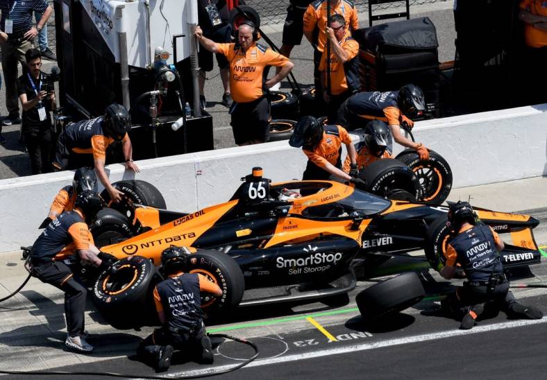 Arrow McLaren SP driver Tony Kanaan (66) makes a pit stop Monday, May 22, 2023, during practice ahead of the 107th running of the Indianapolis 500 at Indianapolis Motor Speedway.
