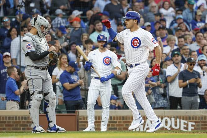 Christopher Morel of the Chicago Cubs hits a two run home run in