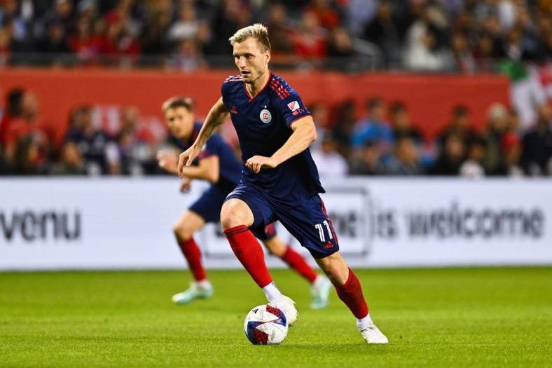 May 20, 2023; Chicago, Illinois, USA;  Chicago Fire FC forward Kacper Przybylko (11) controls the ball against the Atlanta United FC at Soldier Field. Mandatory Credit: Jamie Sabau-USA TODAY Sports