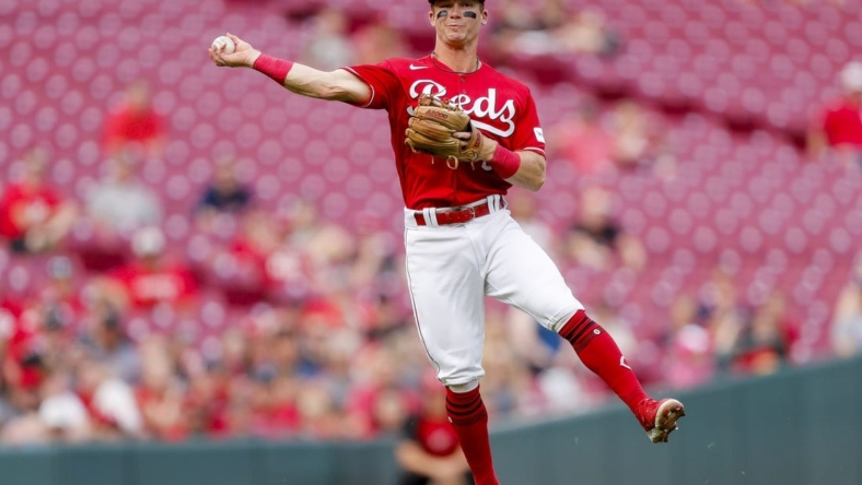 May 24, 2023; Cincinnati, Ohio, USA; Cincinnati Reds shortstop Matt McLain (9) throws to first to get St. Louis Cardinals right fielder Oscar Mercado (not pictured) out in the second inning at Great American Ball Park. Mandatory Credit: Katie Stratman-USA TODAY Sports