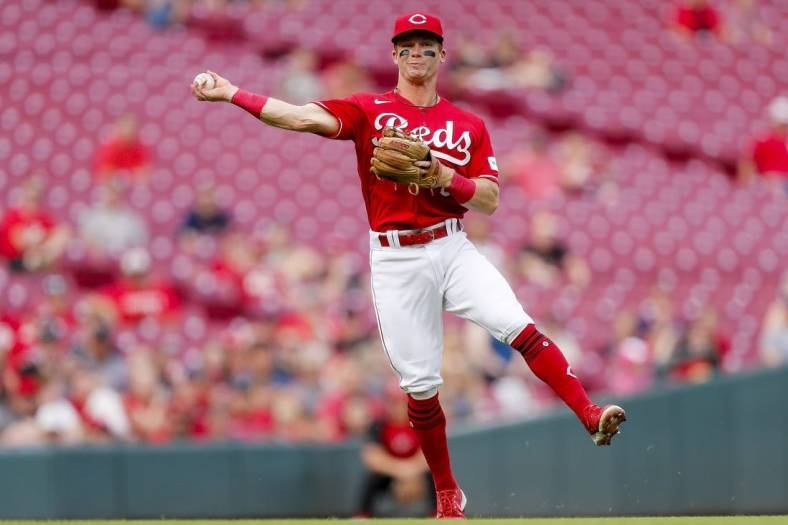 May 24, 2023; Cincinnati, Ohio, USA; Cincinnati Reds shortstop Matt McLain (9) throws to first to get St. Louis Cardinals right fielder Oscar Mercado (not pictured) out in the second inning at Great American Ball Park. Mandatory Credit: Katie Stratman-USA TODAY Sports