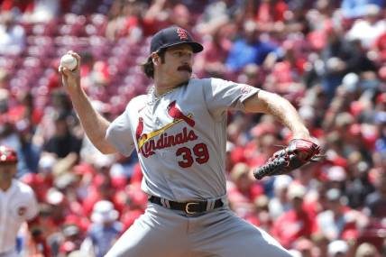 May 25, 2023; Cincinnati, Ohio, USA; St. Louis Cardinals starting pitcher Miles Mikolas (39) throws against the Cincinnati Reds during the first inning at Great American Ball Park. Mandatory Credit: David Kohl-USA TODAY Sports