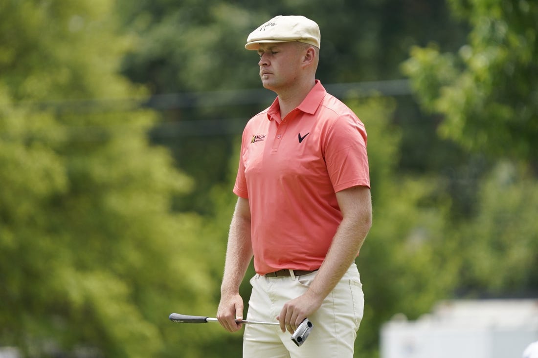 May 25, 2023; Fort Worth, Texas, USA; Harry Hall prepares to putt on the 17th green during the first round of the Charles Schwab Challenge golf tournament. Mandatory Credit: Raymond Carlin III-USA TODAY Sports